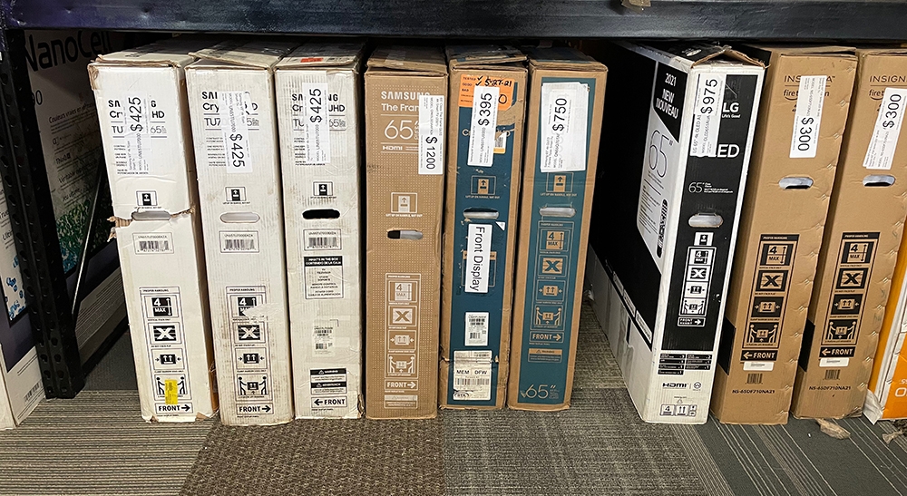Assorted TV's in boxes