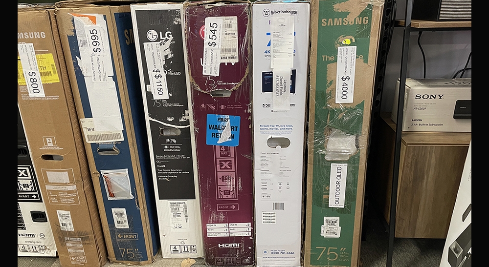 Assorted TV's in boxes