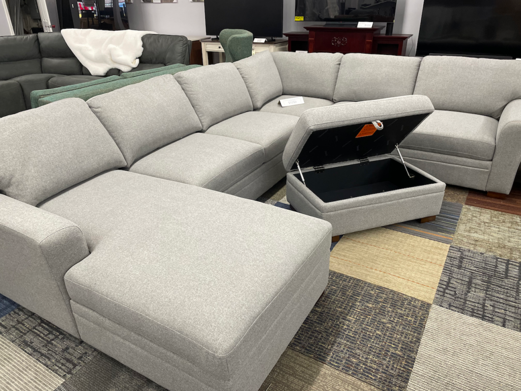 Light brown fabric sectional with ottoman