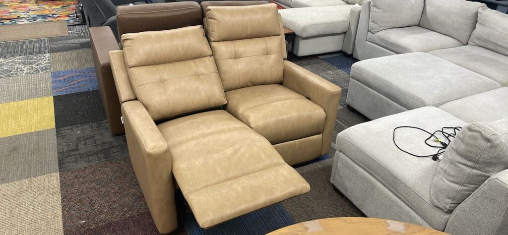 Light brown leather reclining mini couch
