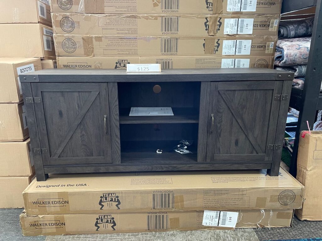 Dark gray TV console with 2 doors and 2 shelves