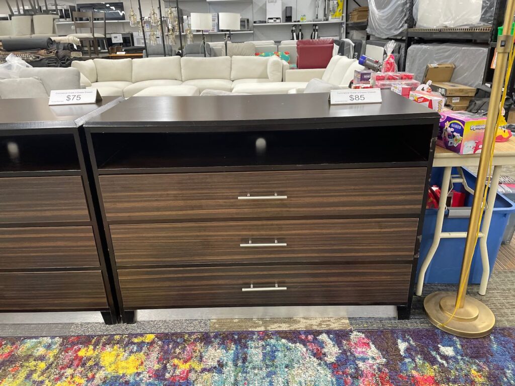 Wood tone TV console with 1 shelf and 3 drawers
