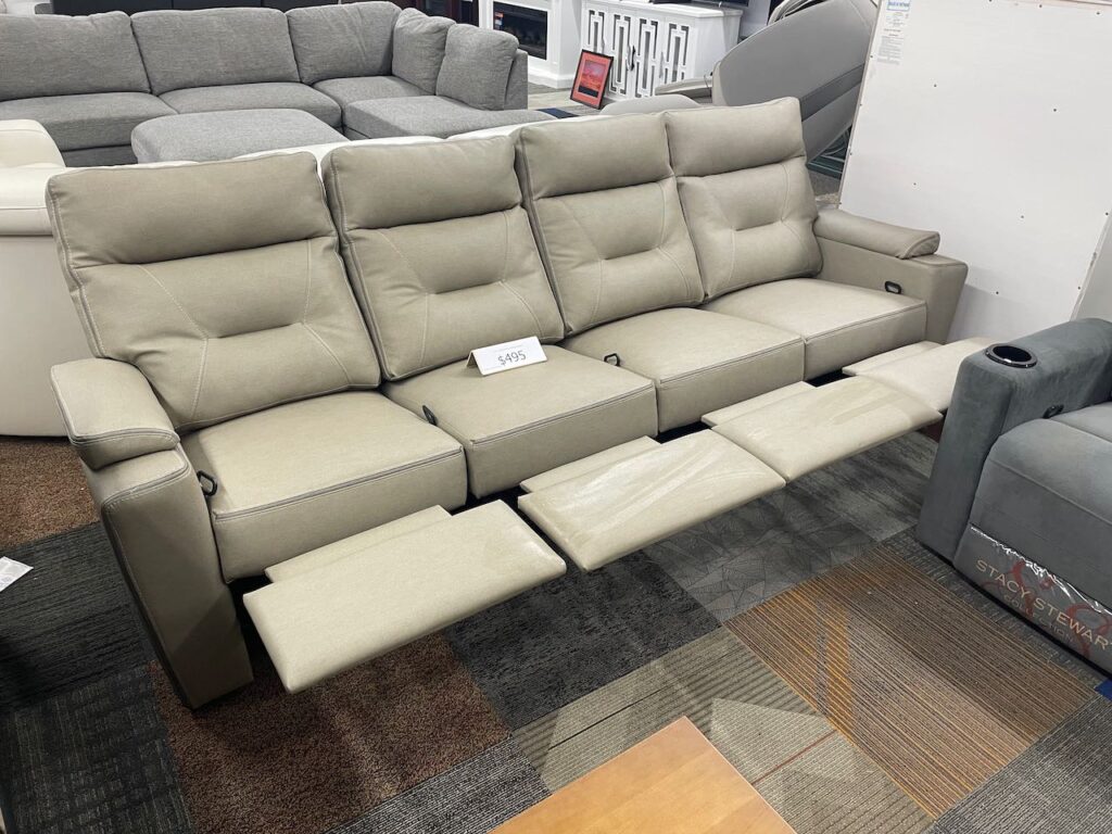 Leather Beige couch with 4 sections of recliners