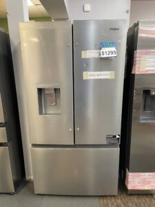 Top side-by-side refrigerator and bottom freezer