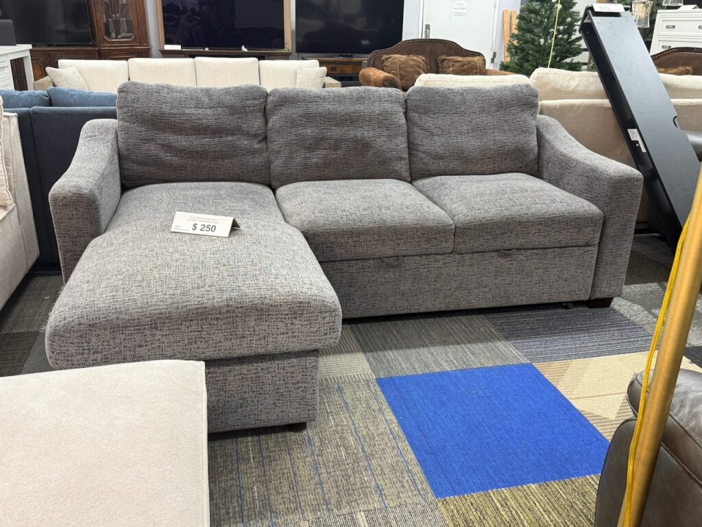 Gray textured fabric couch with lounge