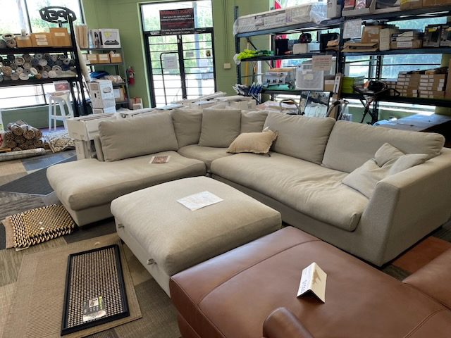 Light brown fabric sectional with ottoman