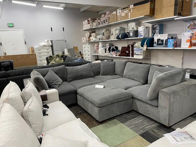 Gray fabric sectional with ottoman